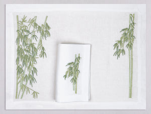 White linen placemat and napkin set embroidered with green bamboo shoots, 100% European linen, handcrafted by Plein Soleil.
