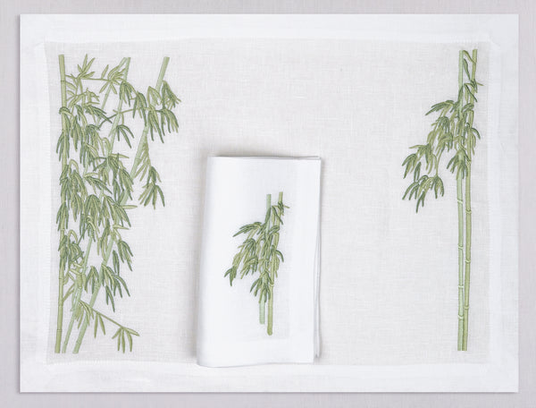 White linen placemat and napkin set embroidered with green bamboo shoots, 100% European linen, handcrafted by Plein Soleil.