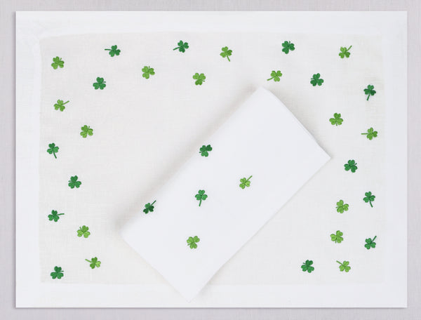 White linen placemat and napkin set embroidered with green cloves, 100% European linen, handcrafted by Plein Soleil.