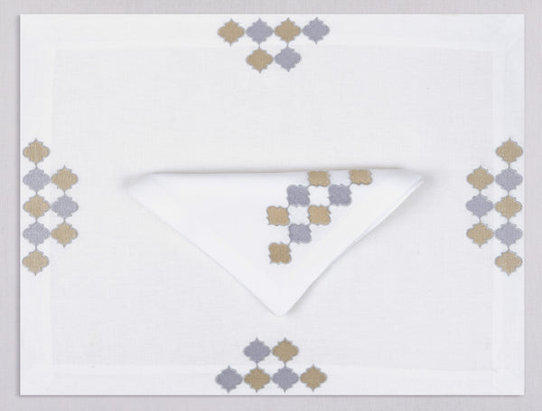 White linen placemat and napkin set embroidered with gold and silver damas motif, 100% European linen, handcrafted by Plein Soleil.