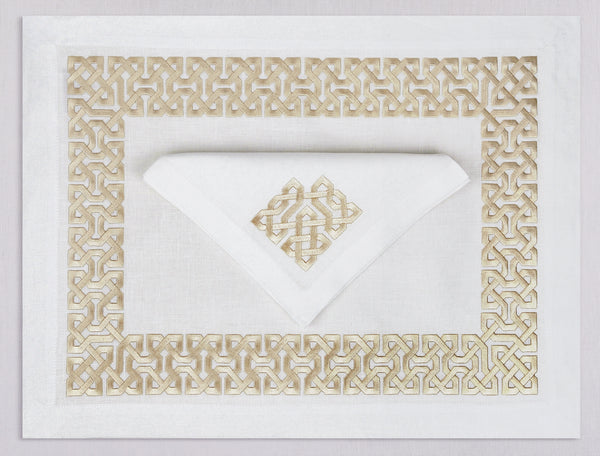 White linen placemat and napkin set embroidered with gold damasque motif border, 100% European linen, handcrafted by Plein Soleil.
