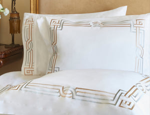 Detail of Deco Duvet Cover Set – Art Deco-inspired geometric border embroidered on Egyptian cotton pillow shams and top sheet.