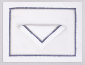 White linen placemat and napkin set embroidered with navy fluffy frame border, 100% European linen, handcrafted by Plein Soleil.