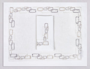 White linen placemat and napkin set embroidered with ivory geometric motif border, 100% European linen, handcrafted by Plein Soleil.
