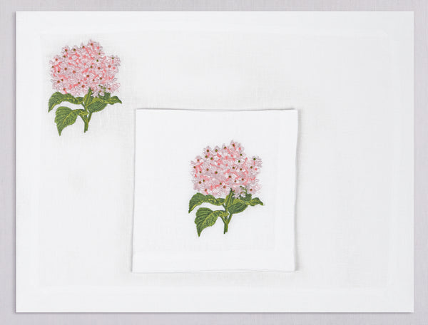 White linen placemat and napkin set embroidered with pink hydragea, 100% European linen, handcrafted by Plein Soleil.