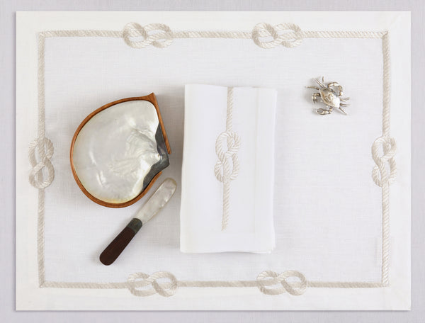 White linen placemat and napkin set embroidered with ivory sailor's knot, 100% European linen, handcrafted by Plein Soleil.