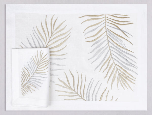White linen placemat and napkin set embroidered with gold and silver le sud leaves, 100% European linen, handcrafted by Plein Soleil.