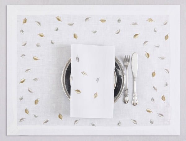 White linen placemat and napkin set embroidered with gold and silver small leaves, 100% European linen, handcrafted by Plein Soleil.