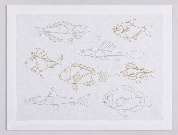 White linen placemat and napkin set embroidered with gold and silver outline fish, 100% European linen, handcrafted by Plein Soleil.