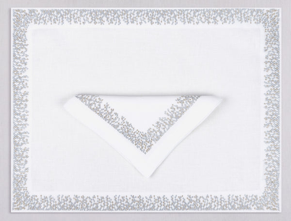 White rectangle linen placemat and napkin set embroidered with silver waterfall motif border, 100% European linen, handcrafted by Plein Soleil.