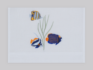 Set of white linen guest towels embroidered with purple, yellow, and pink thistle flowers – luxury floral bath linens by Plein Soleil.