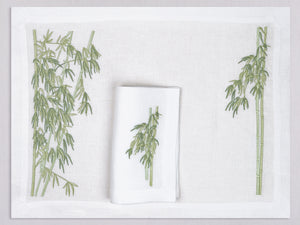 White linen placemat and napkin set embroidered with green bamboo shoots, 100% European linen, handcrafted by Plein Soleil.