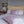 Butterfly Blossom Duvet Cover Set in pink Egyptian cotton with butterfly embroidery – flanged shams and pillowcases on bed, styled in luxury bedroom.