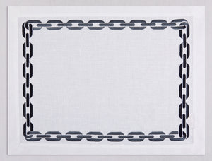 White linen placemat and napkin set embroidered with anthracite chain motif border, 100% European linen, handcrafted by Plein Soleil.