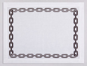 White linen placemat and napkin set embroidered with taupe chain motif border, 100% European linen, handcrafted by Plein Soleil.