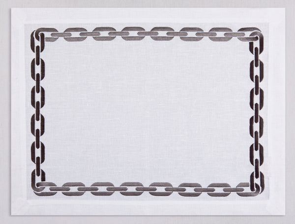 White linen placemat and napkin set embroidered with taupe chain motif border, 100% European linen, handcrafted by Plein Soleil.