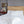 Cherry Blossom Duvet Cover Set in white Egyptian cotton with flower embroidery – flanged shams and pillowcases on bed, styled in luxury bedroom.