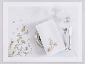 White linen placemat and napkin set embroidered with gold and silver cherry flowers, 100% European linen, handcrafted by Plein Soleil.