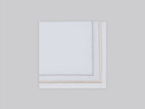 White linen cocktail napkin embroidered with gold and silver line motif border, 100% European linen, handcrafted by Plein Soleil.