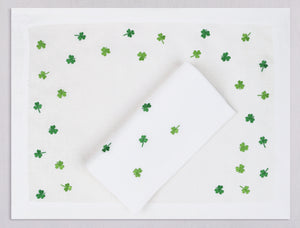 White linen placemat and napkin set embroidered with green cloves, 100% European linen, handcrafted by Plein Soleil.