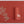 Red linen placemat and napkin set embroidered with beige corals, 100% European linen, handcrafted by Plein Soleil.