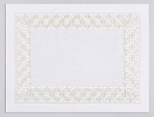 White linen placemat and napkin set embroidered with ivory damasque motif border, 100% European linen, handcrafted by Plein Soleil.