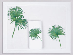 White linen placemat and napkin set embroidered with green date palms, 100% European linen, handcrafted by Plein Soleil.