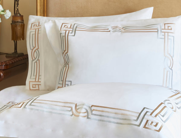 Detail of Deco Duvet Cover Set – Art Deco-inspired geometric border embroidered on Egyptian cotton pillow shams and top sheet.