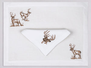 White linen placemat and napkin set embroidered with brown deers, 100% European linen, handcrafted by Plein Soleil.