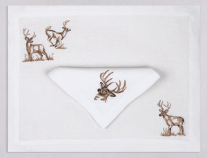White linen placemat and napkin set embroidered with brown deers, 100% European linen, handcrafted by Plein Soleil.