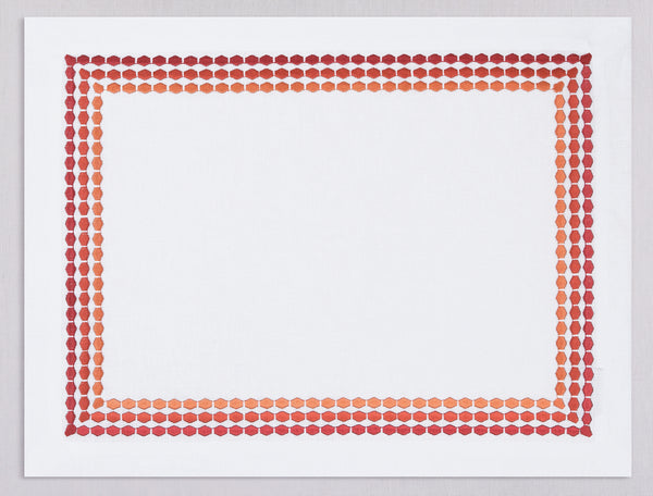 White linen placemat and napkin set embroidered with red diamond frame border, 100% European linen, handcrafted by Plein Soleil.