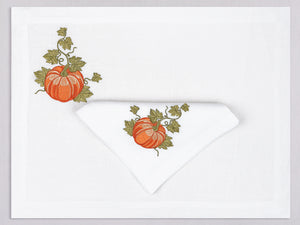White linen placemat and napkin set embroidered with orange pumpkins, 100% European linen, handcrafted by Plein Soleil.