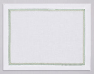 White linen placemat and napkin set embroidered with pistachio fluffy frame border, 100% European linen, handcrafted by Plein Soleil.