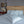 Geometric Duvet Cover Set in ice gray Egyptian cotton with geometric embroidery – flanged shams and pillowcases on bed, styled in luxury bedroom.