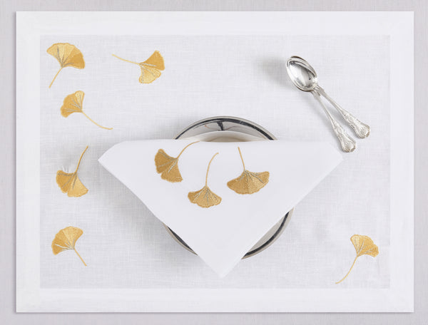 White linen placemat and napkin set embroidered with yellow gingko leaves, 100% European linen, handcrafted by Plein Soleil.