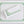 White linen placemat and napkin set embroidered with green greek key motif border, 100% European linen, handcrafted by Plein Soleil.