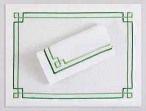 White linen placemat and napkin set embroidered with green greek key motif border, 100% European linen, handcrafted by Plein Soleil.