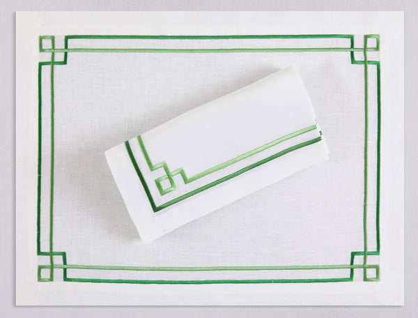White linen placemat and napkin set embroidered with green greek key motif border, 100% European linen, handcrafted by Plein Soleil.