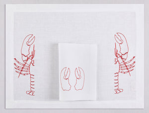 White linen placemat and napkin set embroidered with red half lobsters, 100% European linen, handcrafted by Plein Soleil.