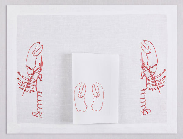White linen placemat and napkin set embroidered with red half lobsters, 100% European linen, handcrafted by Plein Soleil.