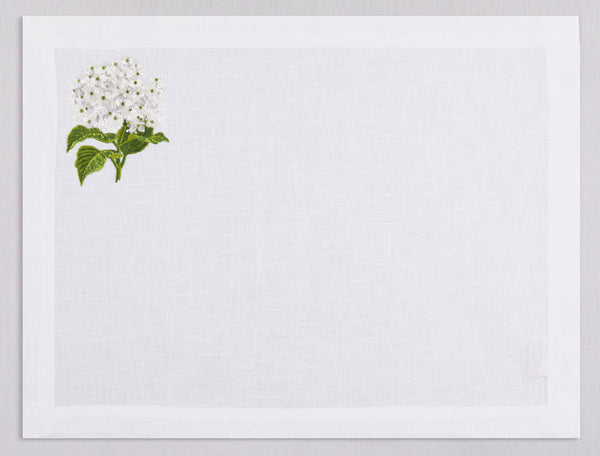 White linen placemat and napkin set embroidered with white hydragea, 100% European linen, handcrafted by Plein Soleil.