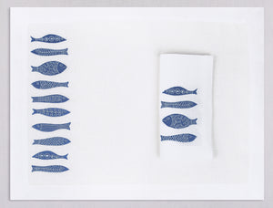 White linen placemat and napkin set embroidered with blue fish, 100% European linen, handcrafted by Plein Soleil.