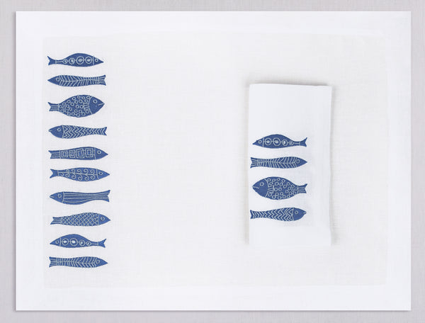White linen placemat and napkin set embroidered with blue fish, 100% European linen, handcrafted by Plein Soleil.
