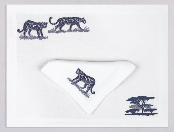 White linen placemat and napkin set embroidered with leopards and safari tree, 100% European linen, handcrafted by Plein Soleil.