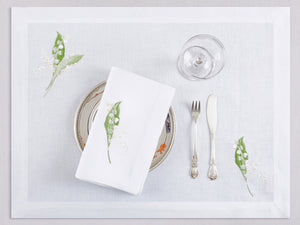 White linen placemat and napkin set embroidered with white and green lily flowers, 100% European linen, handcrafted by Plein Soleil.