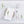 White linen placemat and napkin set embroidered with white and green lily flowers, 100% European linen, handcrafted by Plein Soleil.