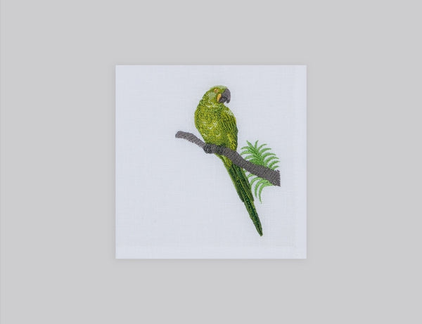 White linen cocktail napkin set embroidered with green macau bird, 100% European linen, handcrafted by Plein Soleil.