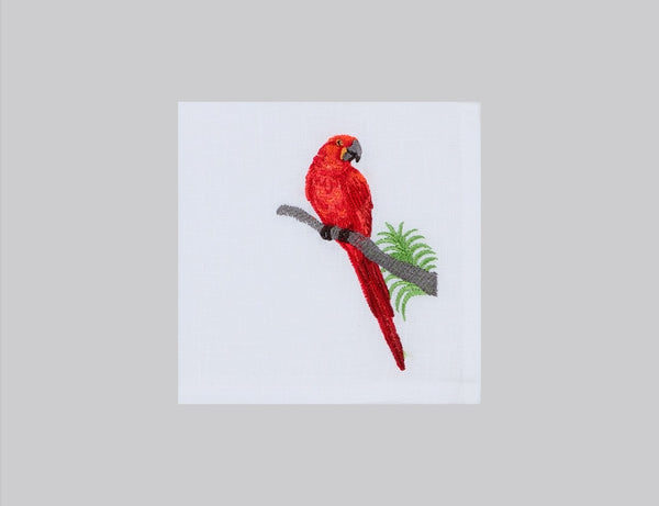 White linen cocktail napkin set embroidered with red macau bird, 100% European linen, handcrafted by Plein Soleil.