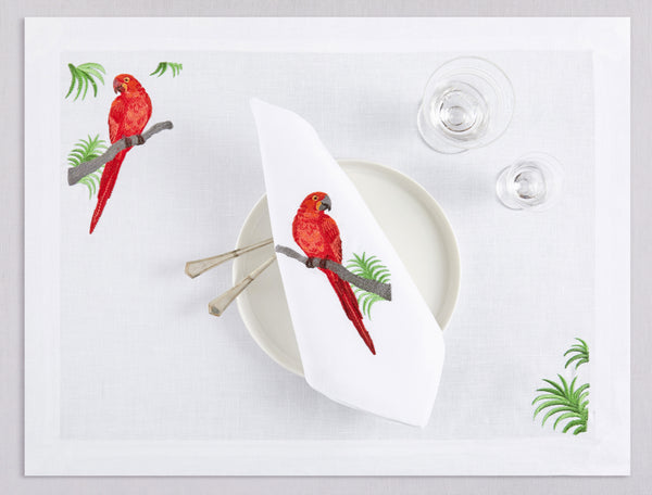 White linen placemat and napkin set embroidered with red macau bird, 100% European linen, handcrafted by Plein Soleil.