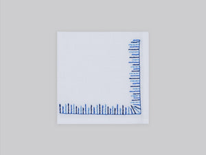 White linen cocktail napkin set embroidered with blue mikado motif border, 100% European linen, handcrafted by Plein Soleil.